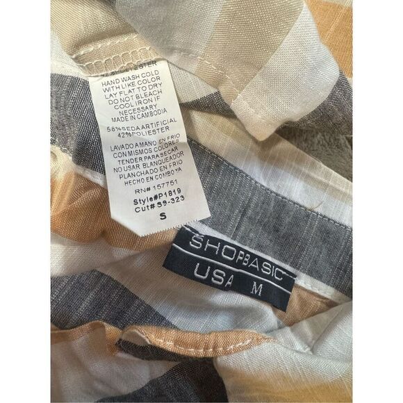 Shop basic women's sleeveless v-neck vertical striped polo tee size S,M - Picture 7 of 7